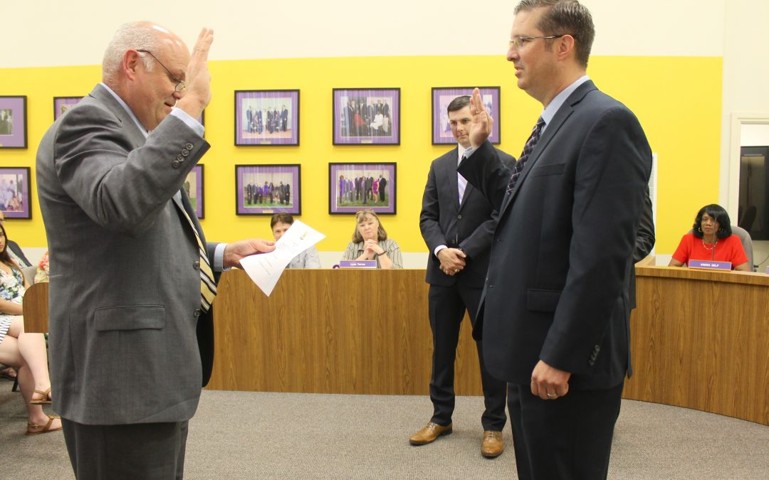 New board member, Matt Knight, sworn into office