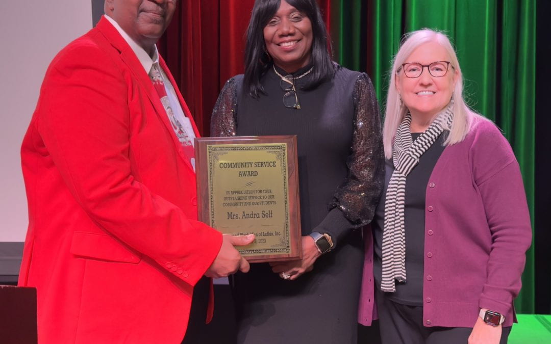 Former board member Andra Self awarded Community Service Award
