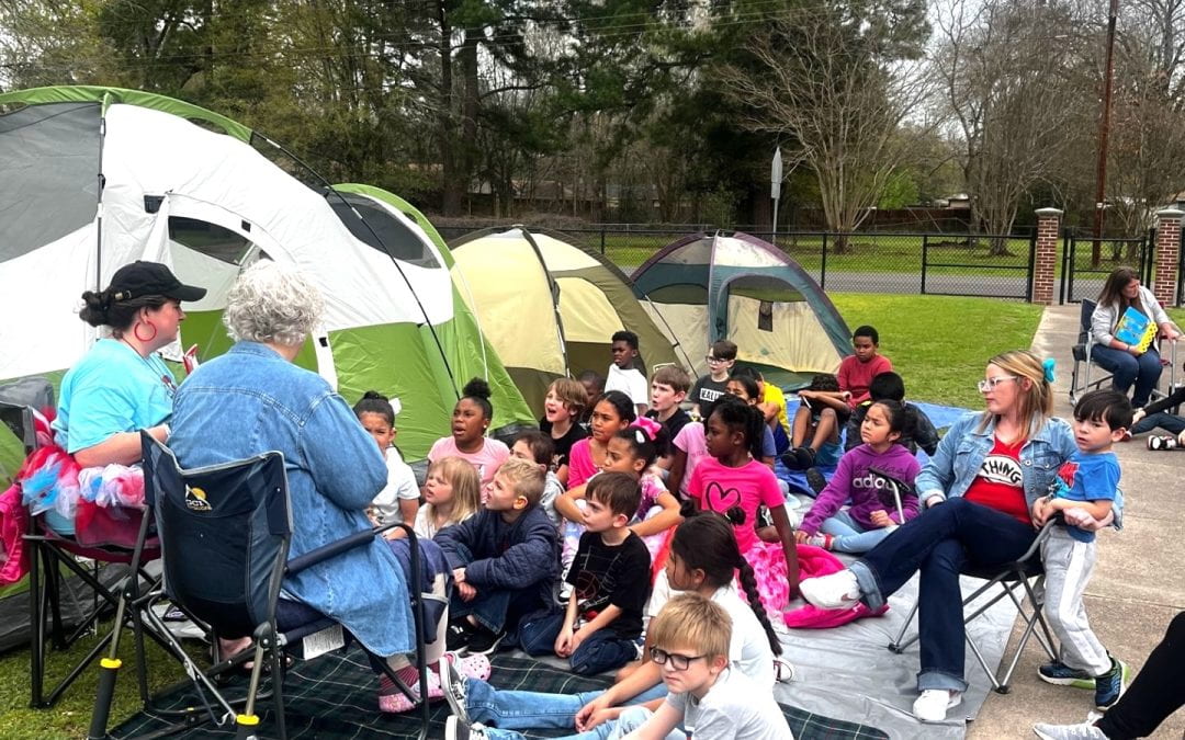 Trout Primary students read in the great outdoors for Read Across America