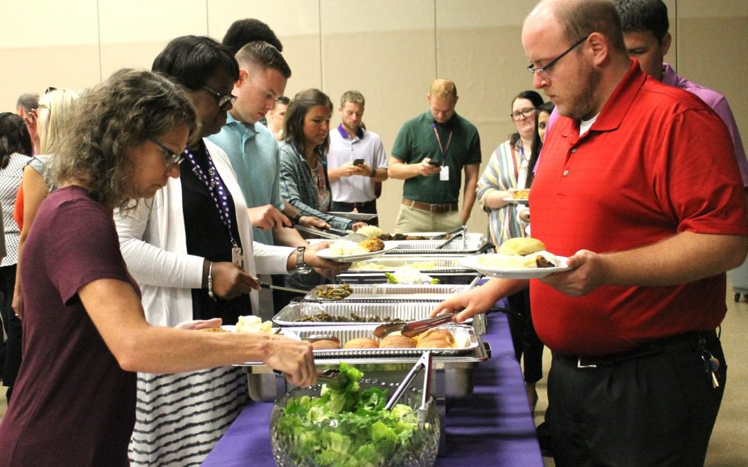 Admin and Board welcome new teachers at luncheon