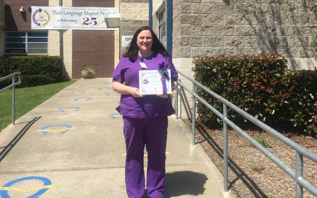 Nurse April Ritter receives the Purple Heart Award this month