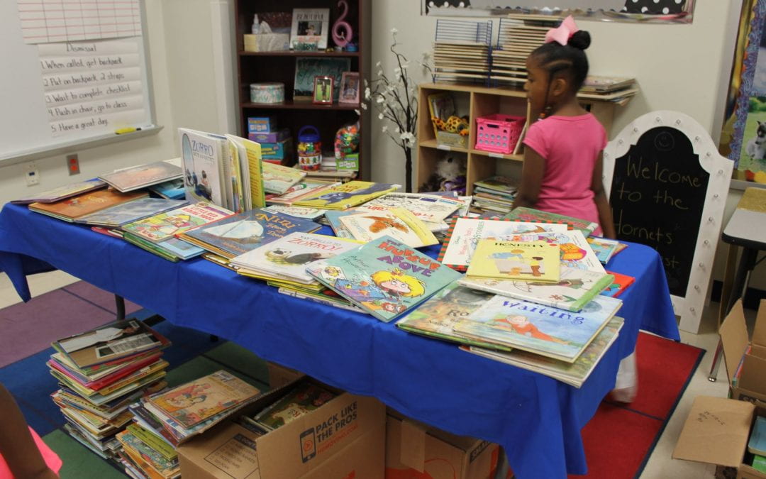 LISD Students receive 26,000 books to take home by Book Buddies of E.T.
