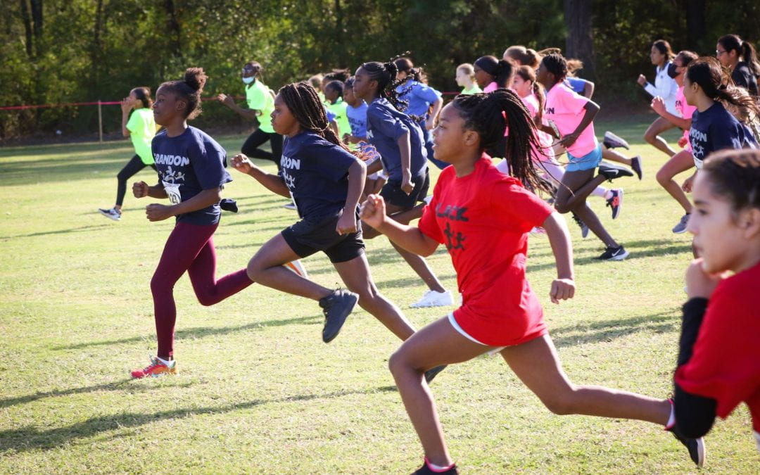 Students race to the finish line at Run of the Panthers