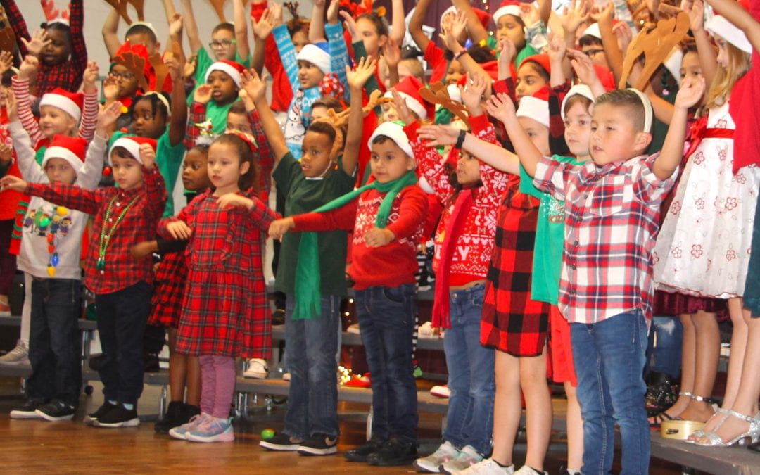 Dunbar first graders spread joy at Christmas program